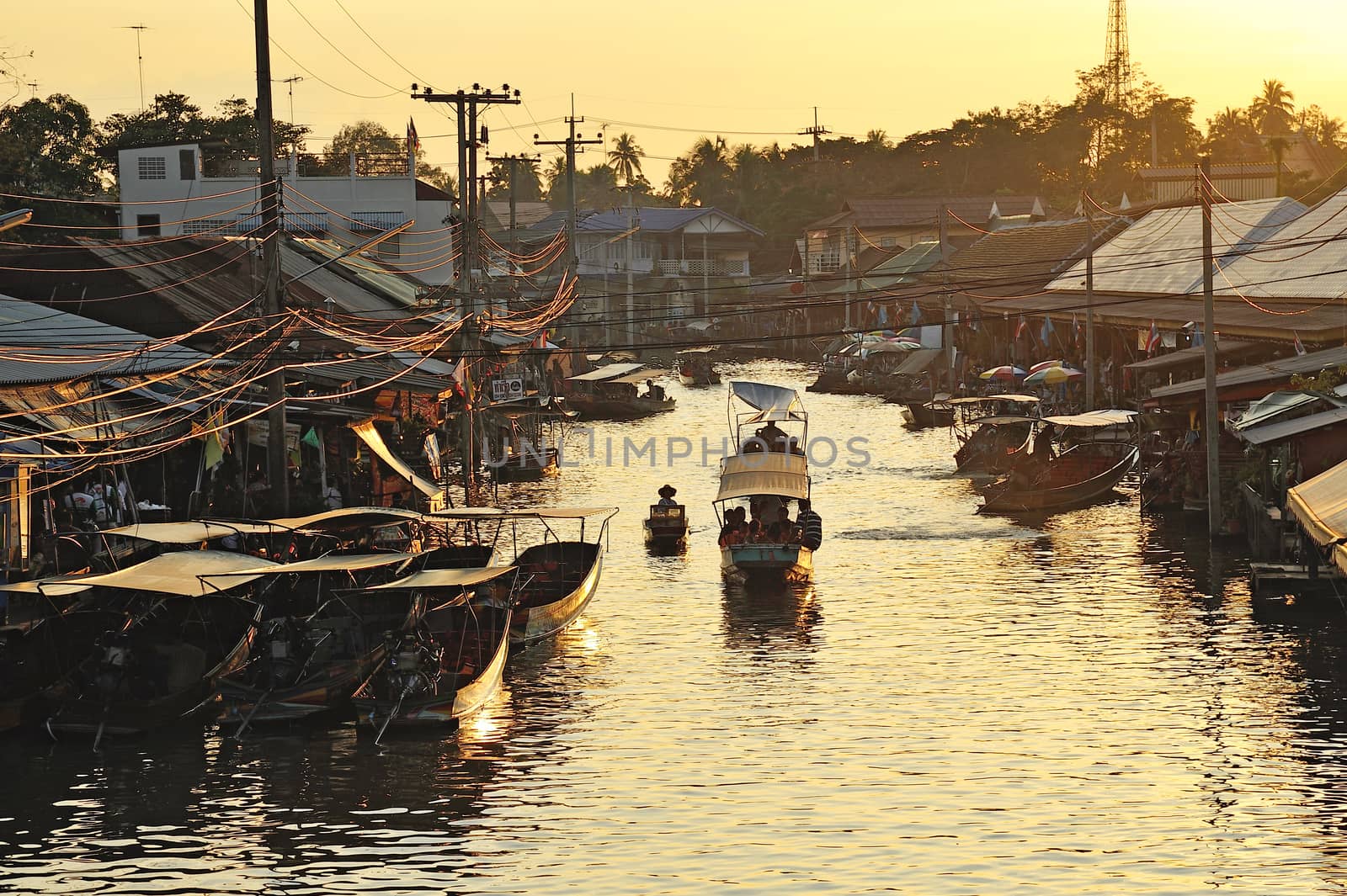 sunset at ampawa floating market, Samut songkram, Thailand.