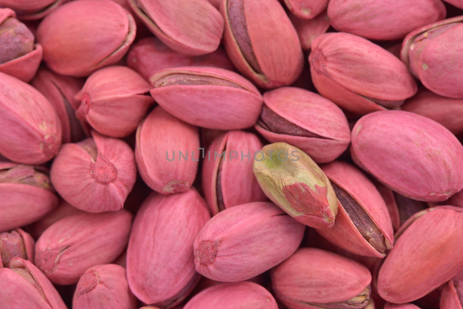 Close-up of red pistachio nut  to use as background