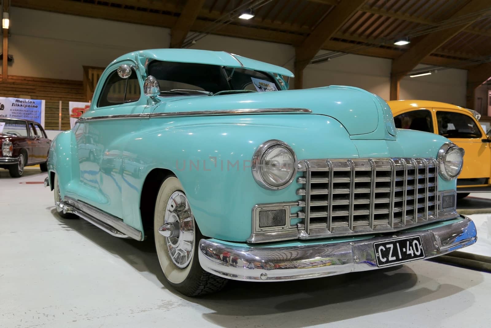 LOIMAA, FINLAND - JUNE 15, 2014: Mint green Dodge Business Coupe 1946 vintage car presented at HeMa Show 2014 in Loimaa, Finland.