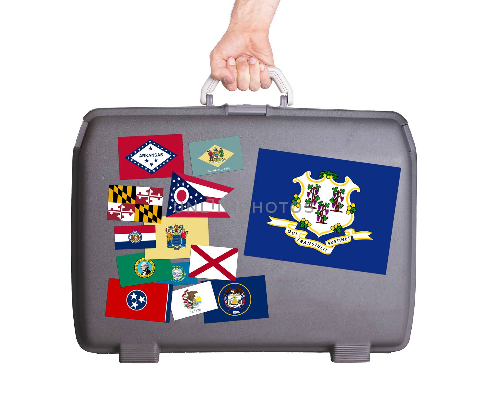 Used plastic suitcase with stains and scratches, stickers of US States, Connecticut