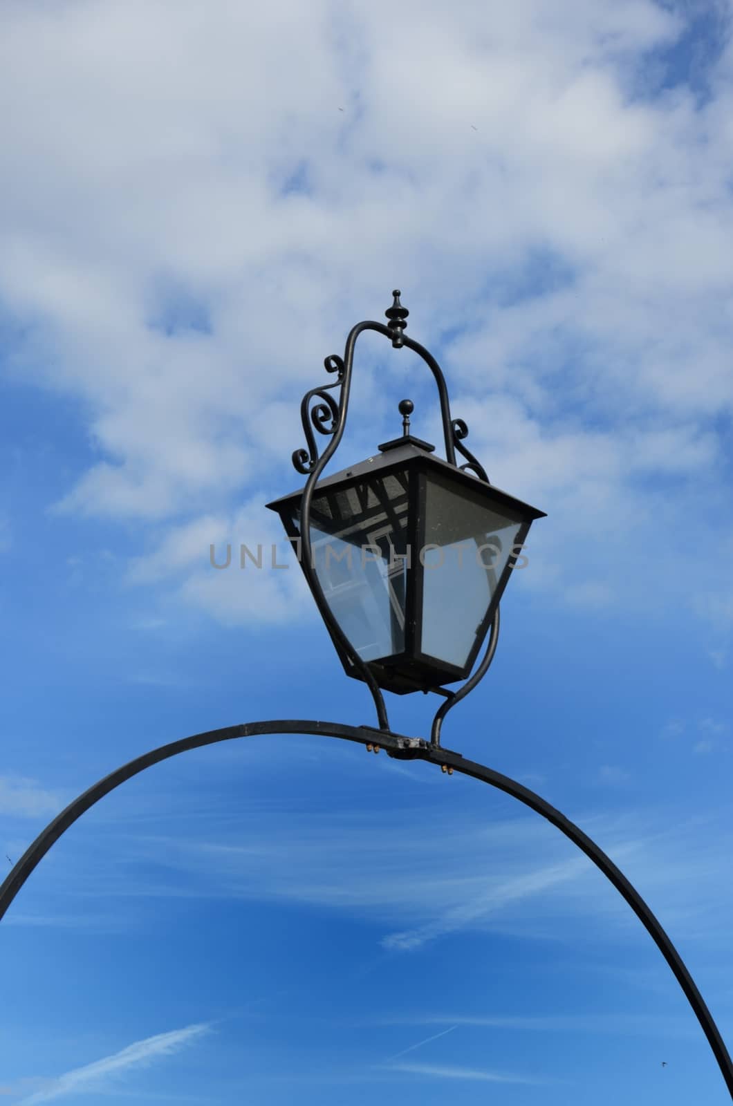 Black cast iron lamp with sky 