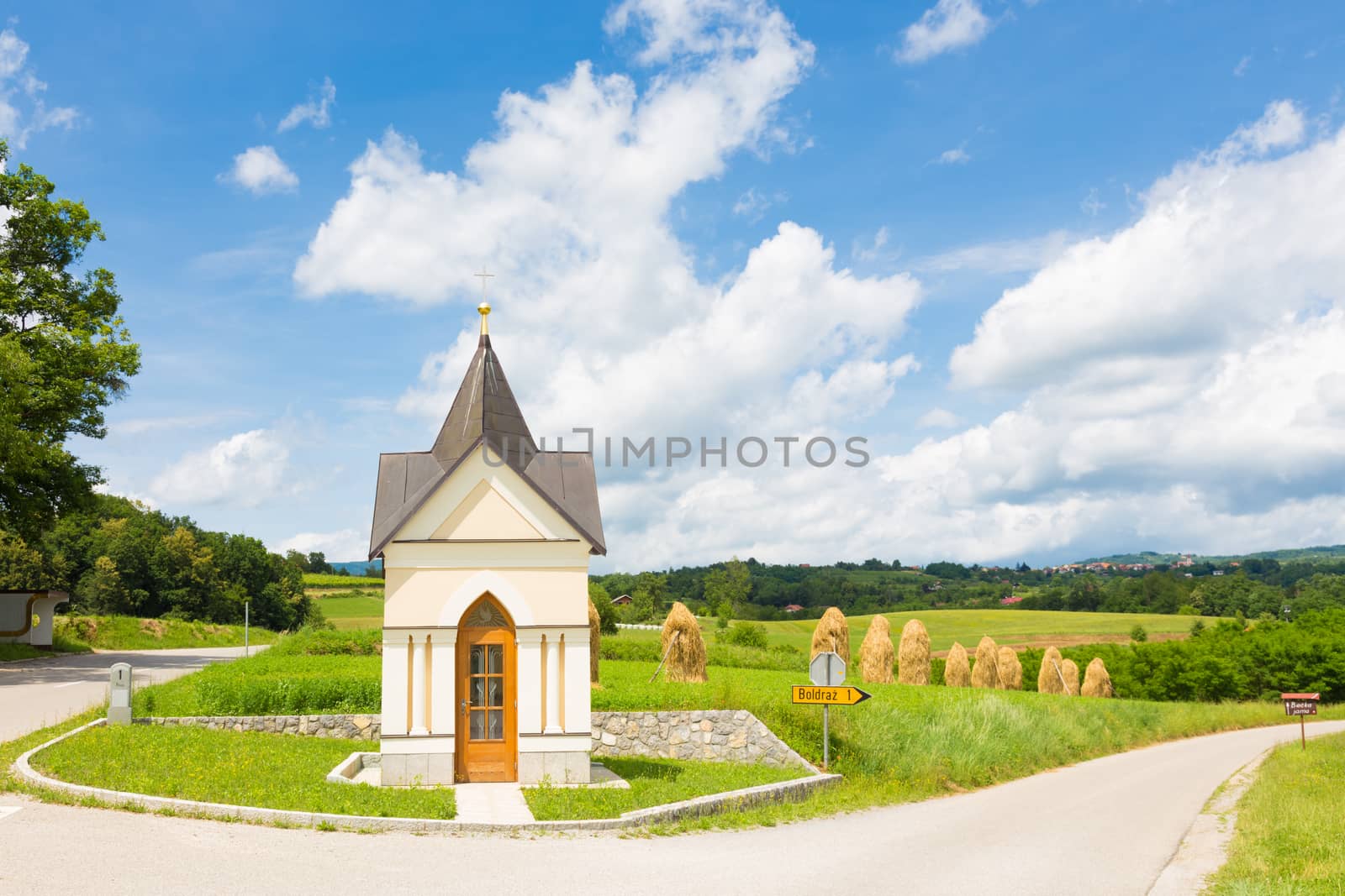 Bela krajina, Slovenia. Traditional hay stacks on the field.