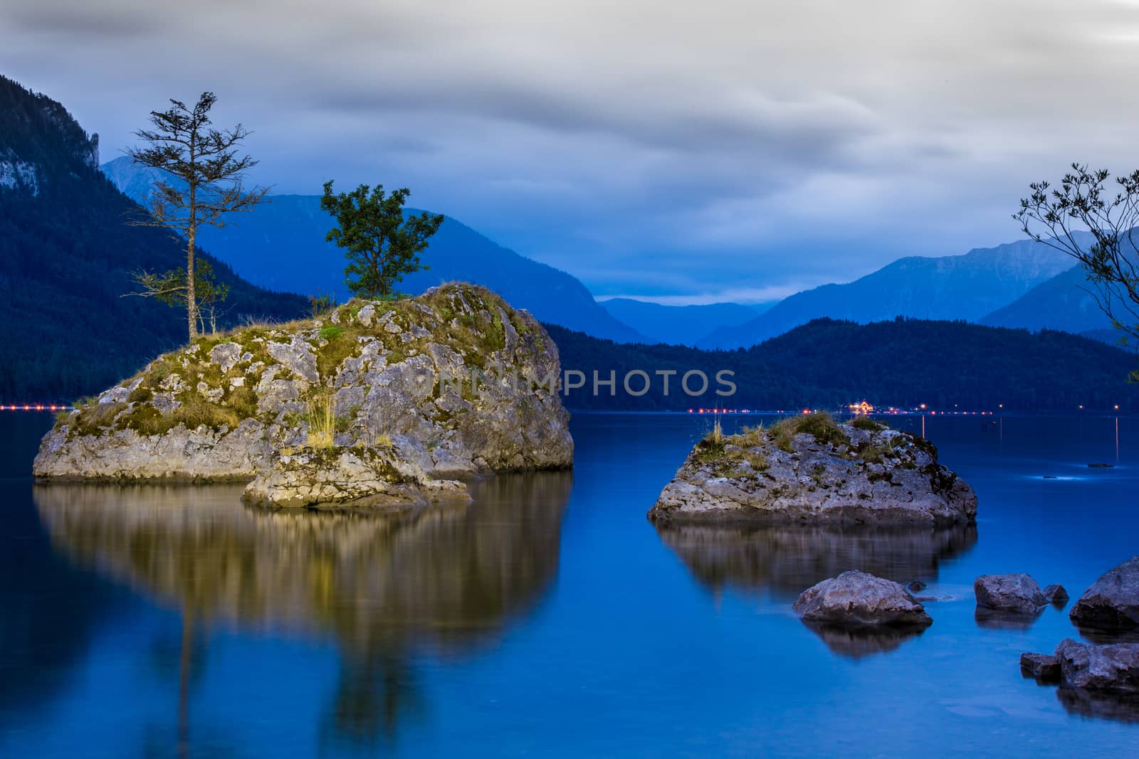 Small island on the lake in mountains Austria