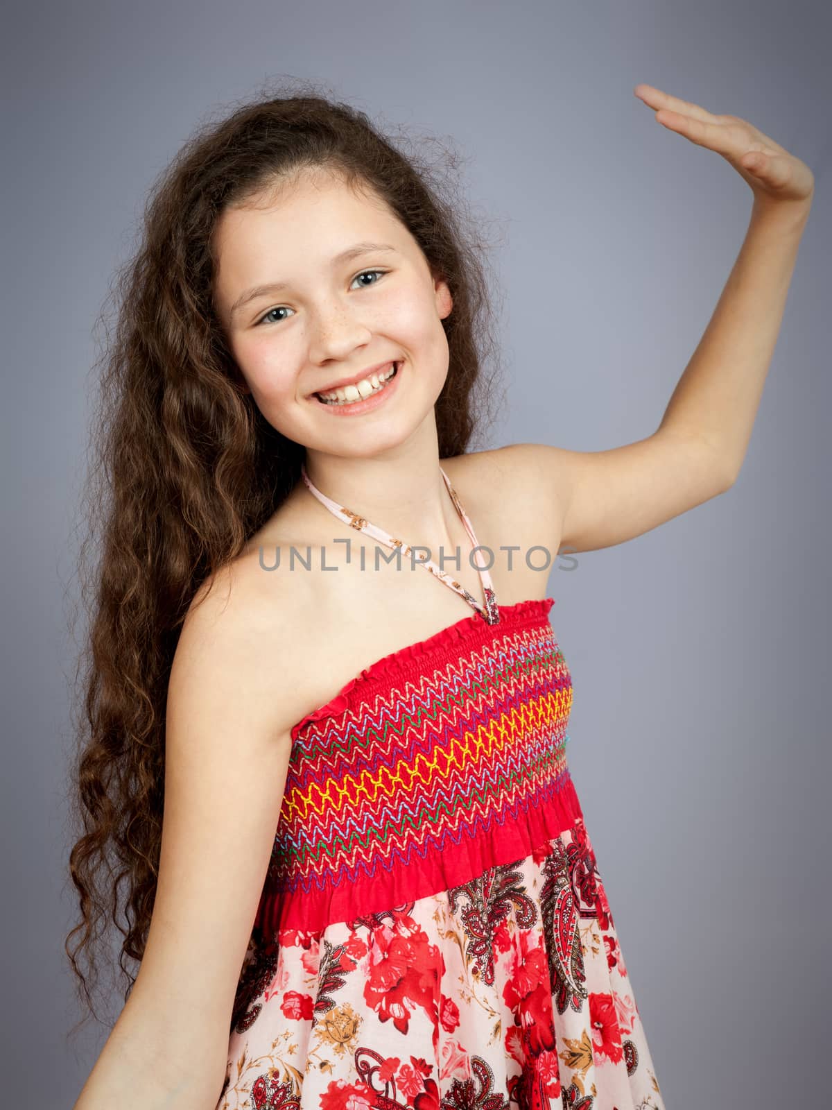 An image of a beautiful young girl dancing