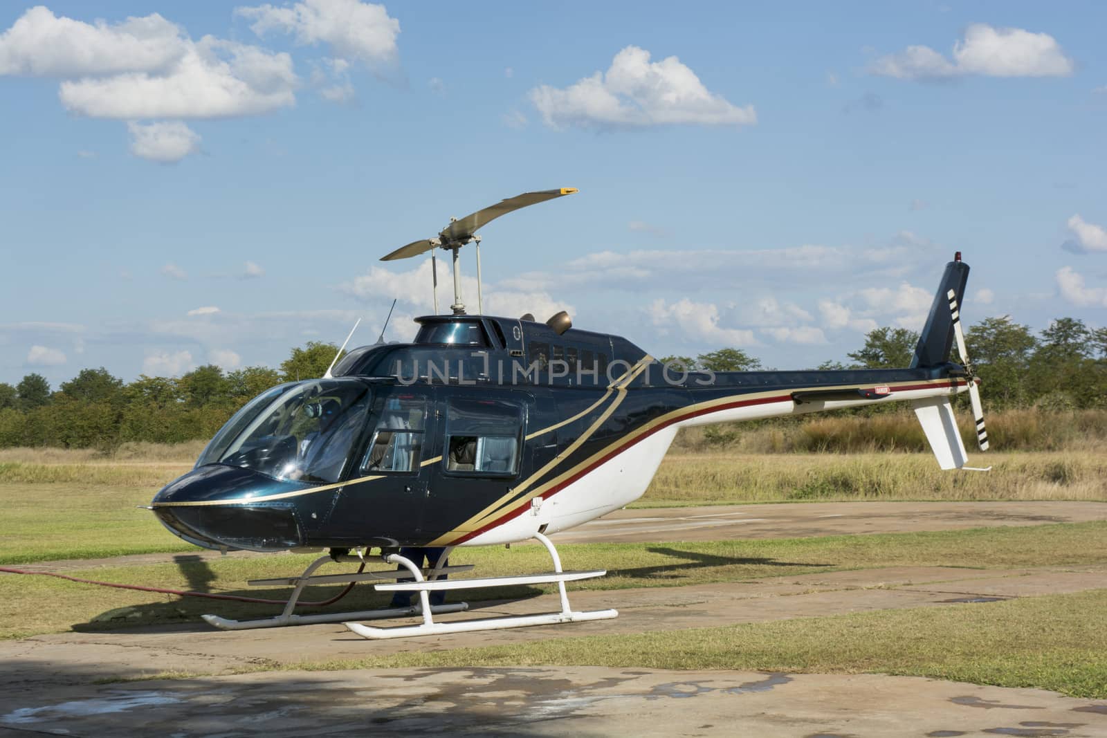 helicopter parked on helipad