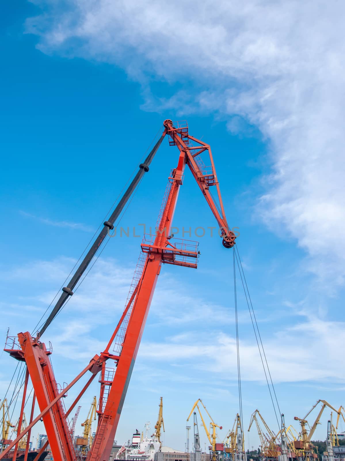 Cargo crane in the port by Zhukow