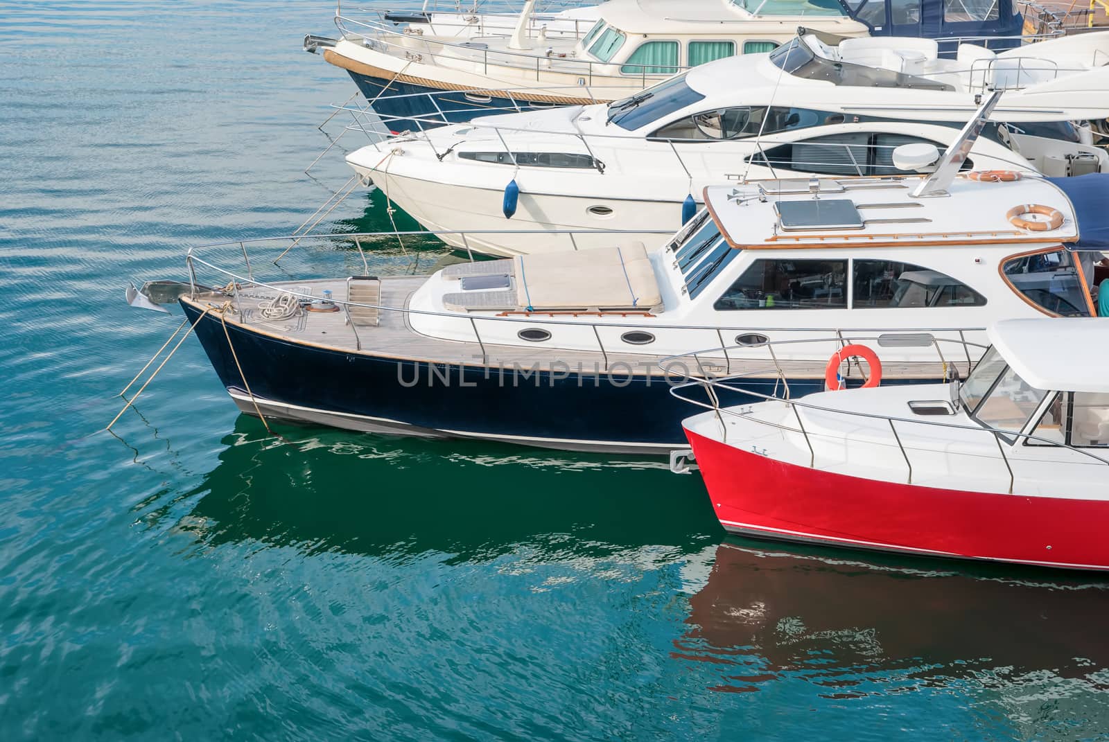 Boats and yachts in the port by Zhukow