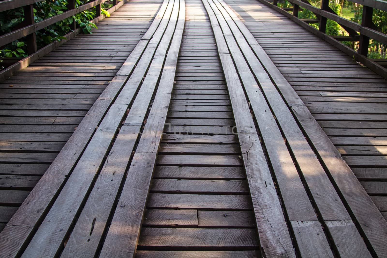 Old wooden bridge by liewluck