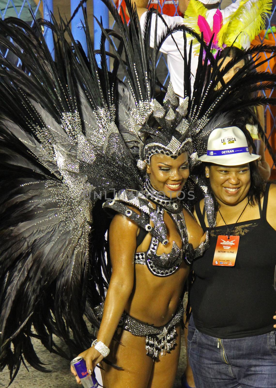 A spectator and an entertainer posing for their photo at a carnaval in Rio de Janeiro, Brazil
03 Mar 2014
No model release
Editorial only