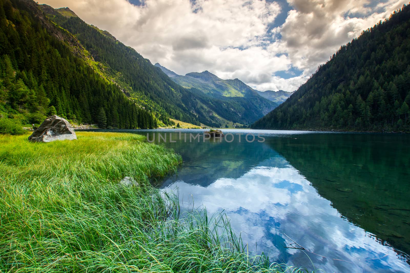 Mountain and lake in high Alps Austria