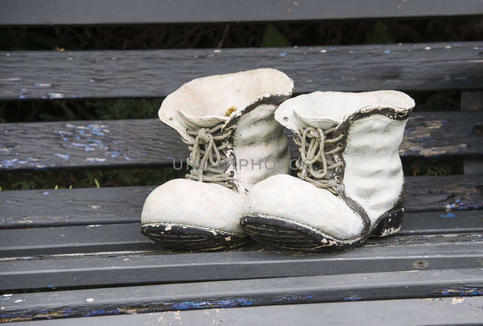 decoration of high shoes on wooden bench