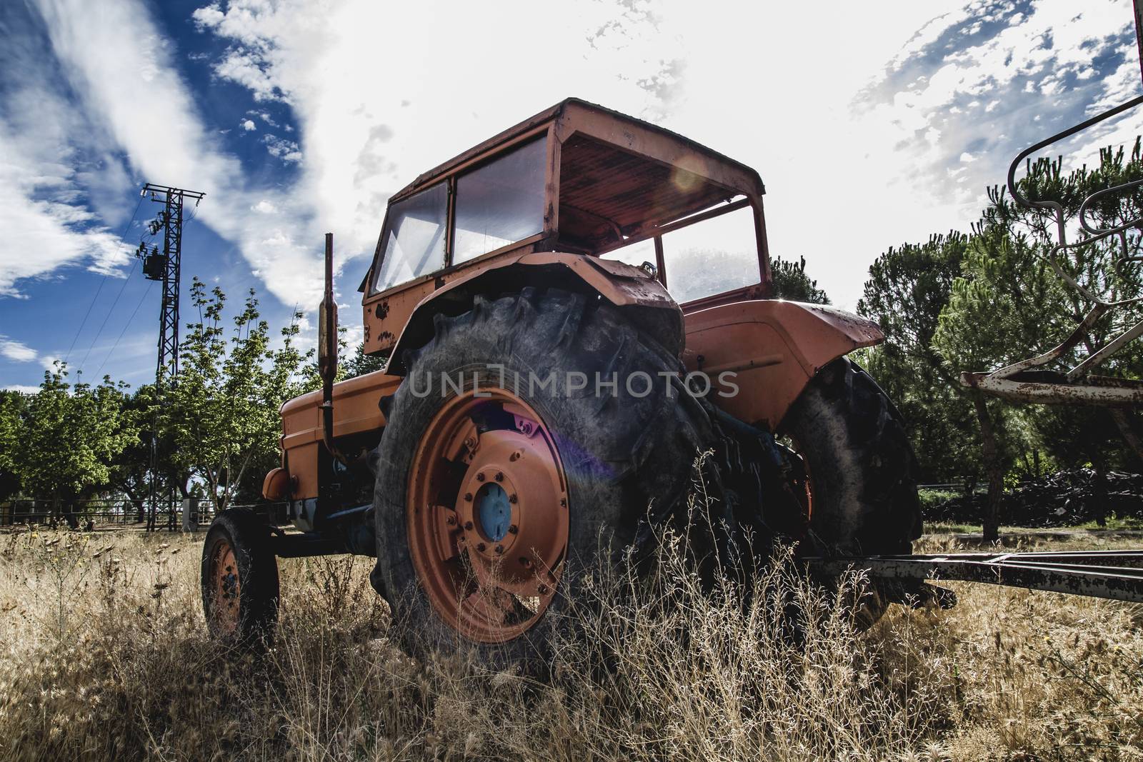 vehicle, old agricultural tractor abandoned in a farm field by FernandoCortes