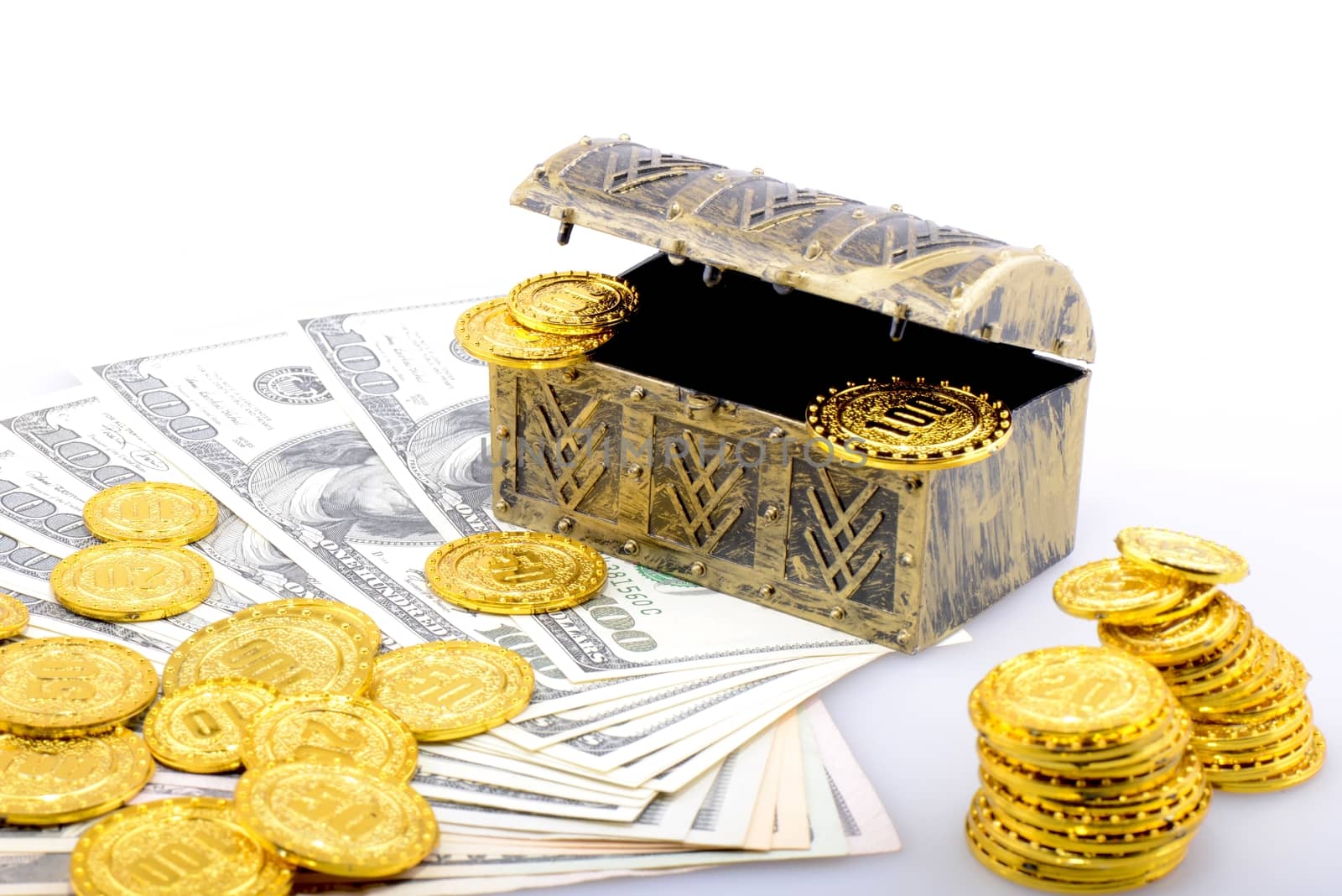 gold coins and dollar banknotes by bbbar