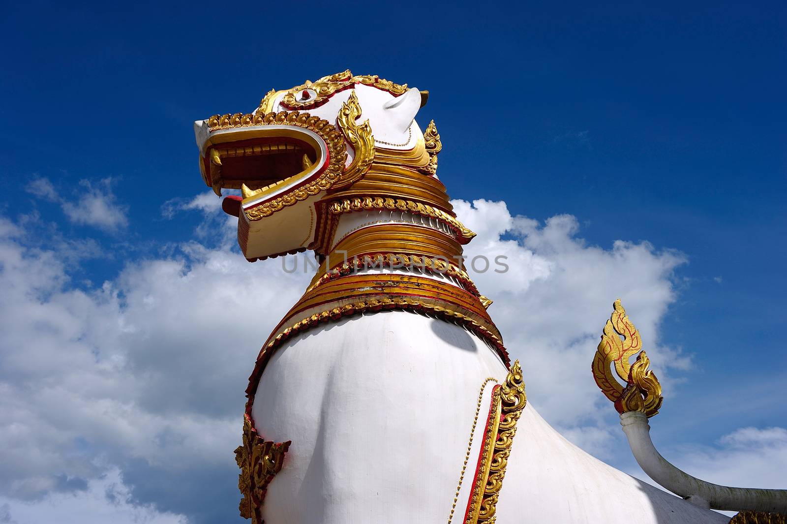 Singha, Lion Statue in front of mon temple in Sangkraburi, Kanchanaburi, Thailand
