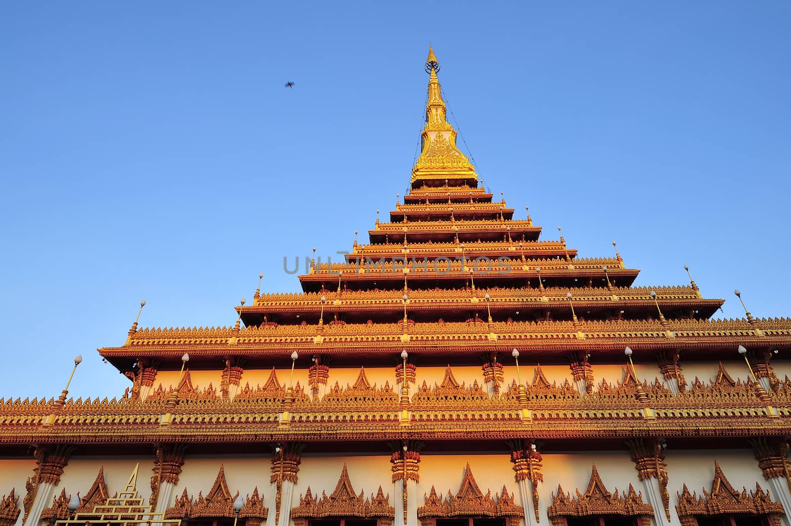 Golden pagoda at Wat Nong Wang temple, Khonkaen Thailand by think4photop