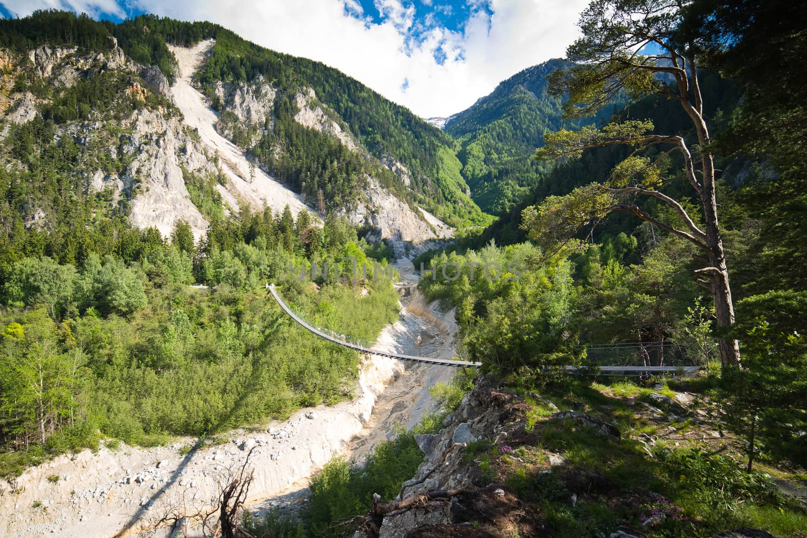 Hanging bridge over seasonal river by furzyk73