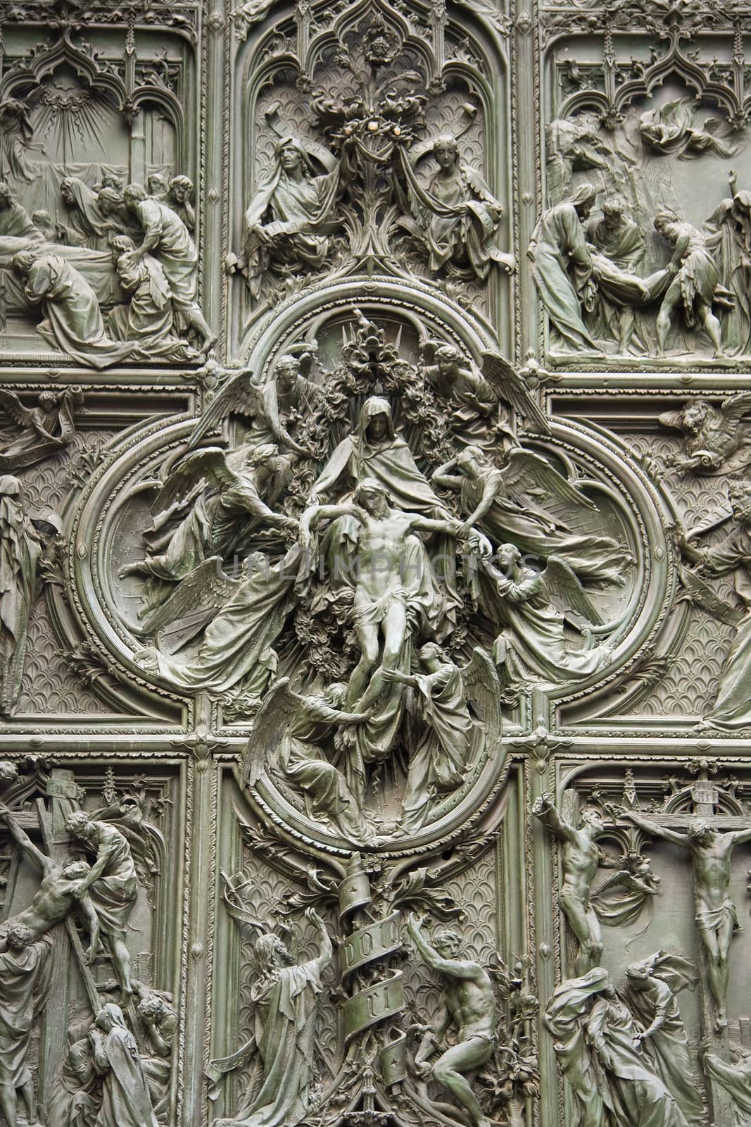 Doors of the Duomo cathedral in Milan, Italy.