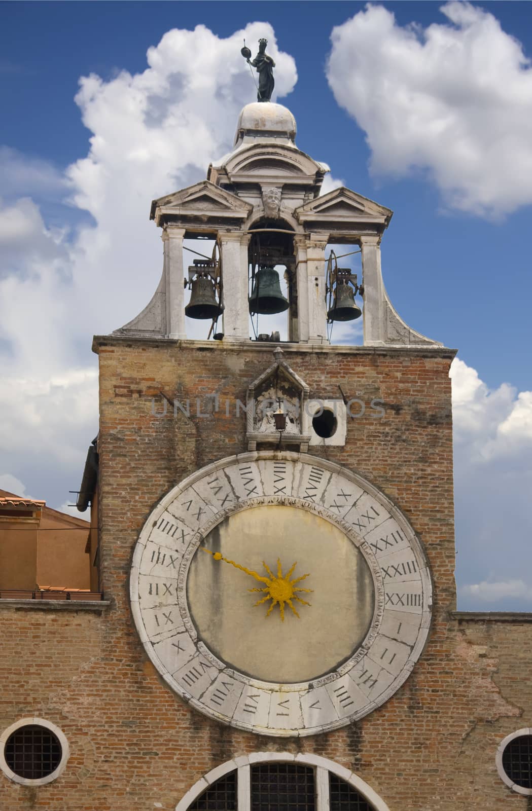 A clock tower with 24hr clock face in Venice by fotoecho