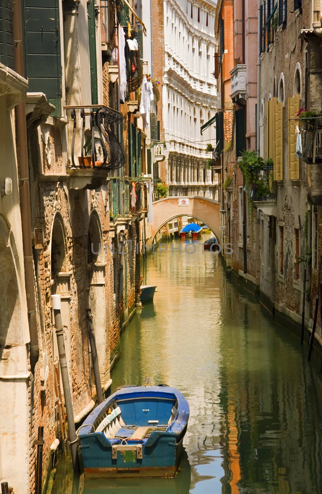 Canal view with boat in Venice by fotoecho
