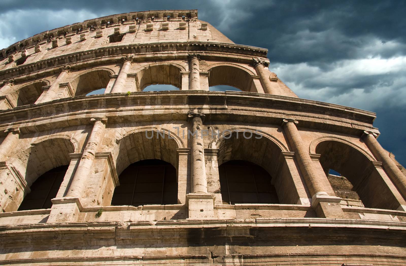 Colosseum ancient amphitheatre in Rome by fotoecho