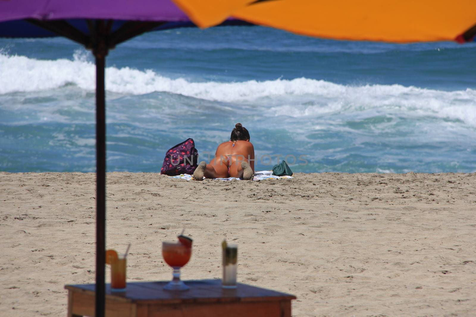 A young lady sun tanning at a beach restaurant in Puerto Escondido, Mexico
26 Mar 2013
No model release
Editorial only