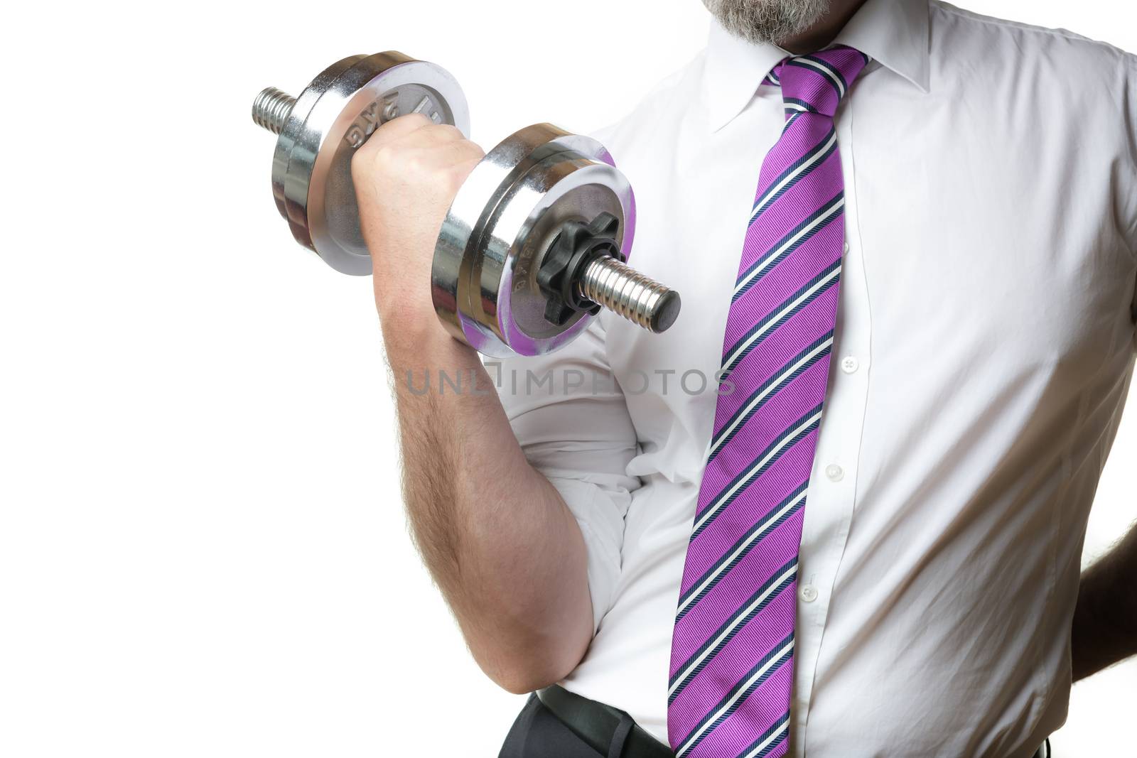 Businessman holding a silver dumbbell in the right hand