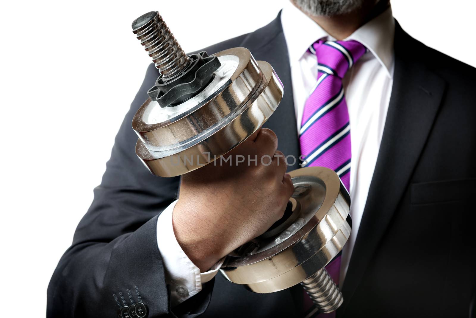 Businessman in black suit holding a silver dumbbell in the right hand