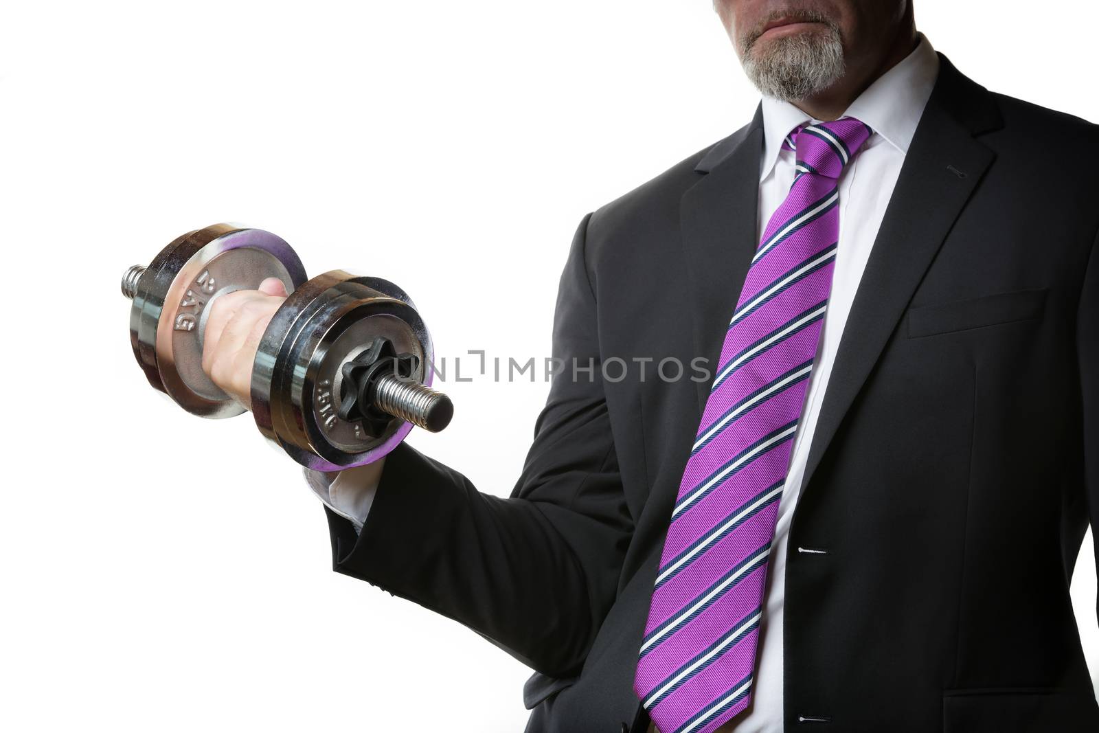 Businessman in black suit holding a silver dumbbell in the right hand