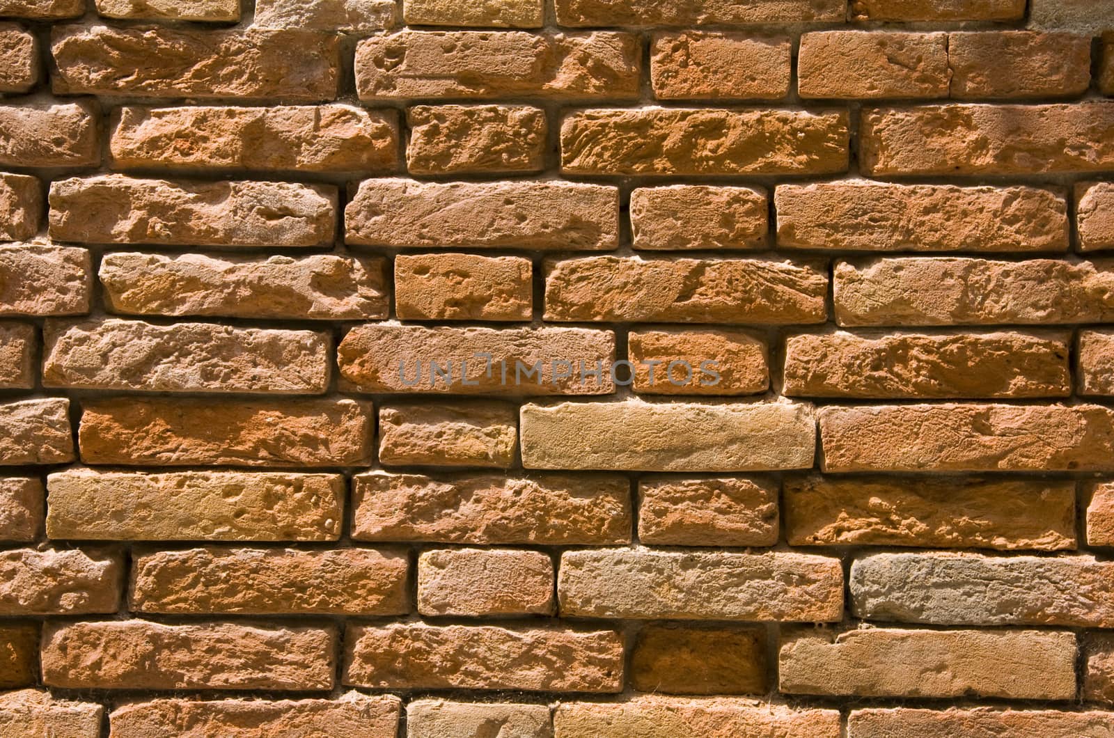 Grunge red brick texture of an old wall