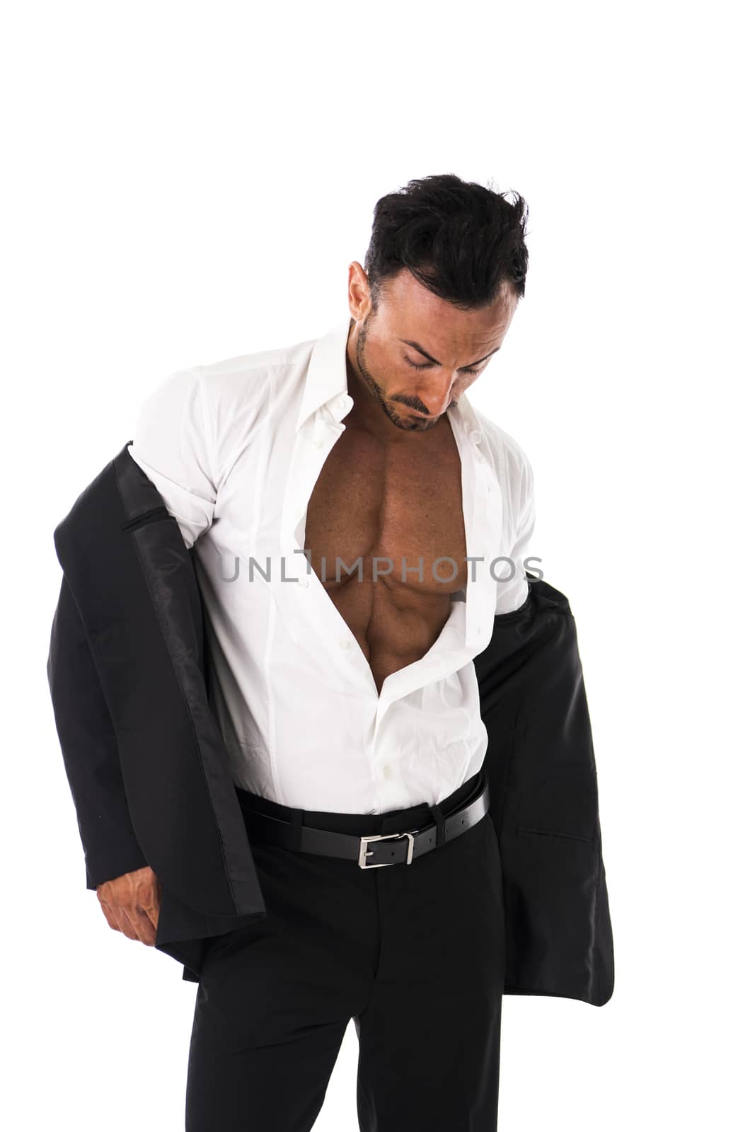 Businessman opening his shirt revealing muscular torso by artofphoto