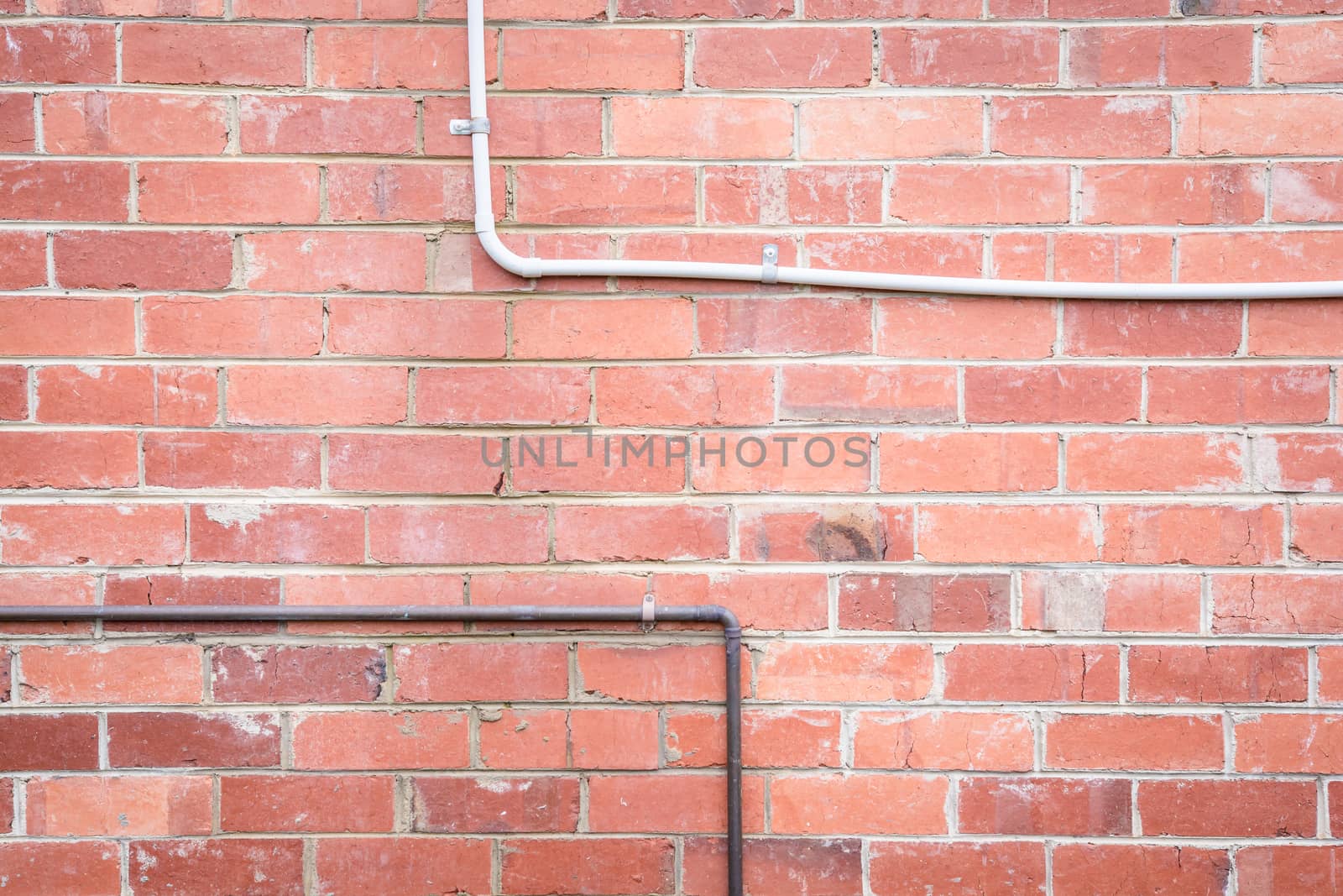 the beautiful brick and pipes of the outside of the house