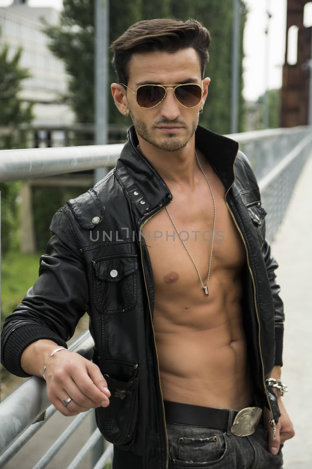 Handsome man outdoor in urban environment by artofphoto