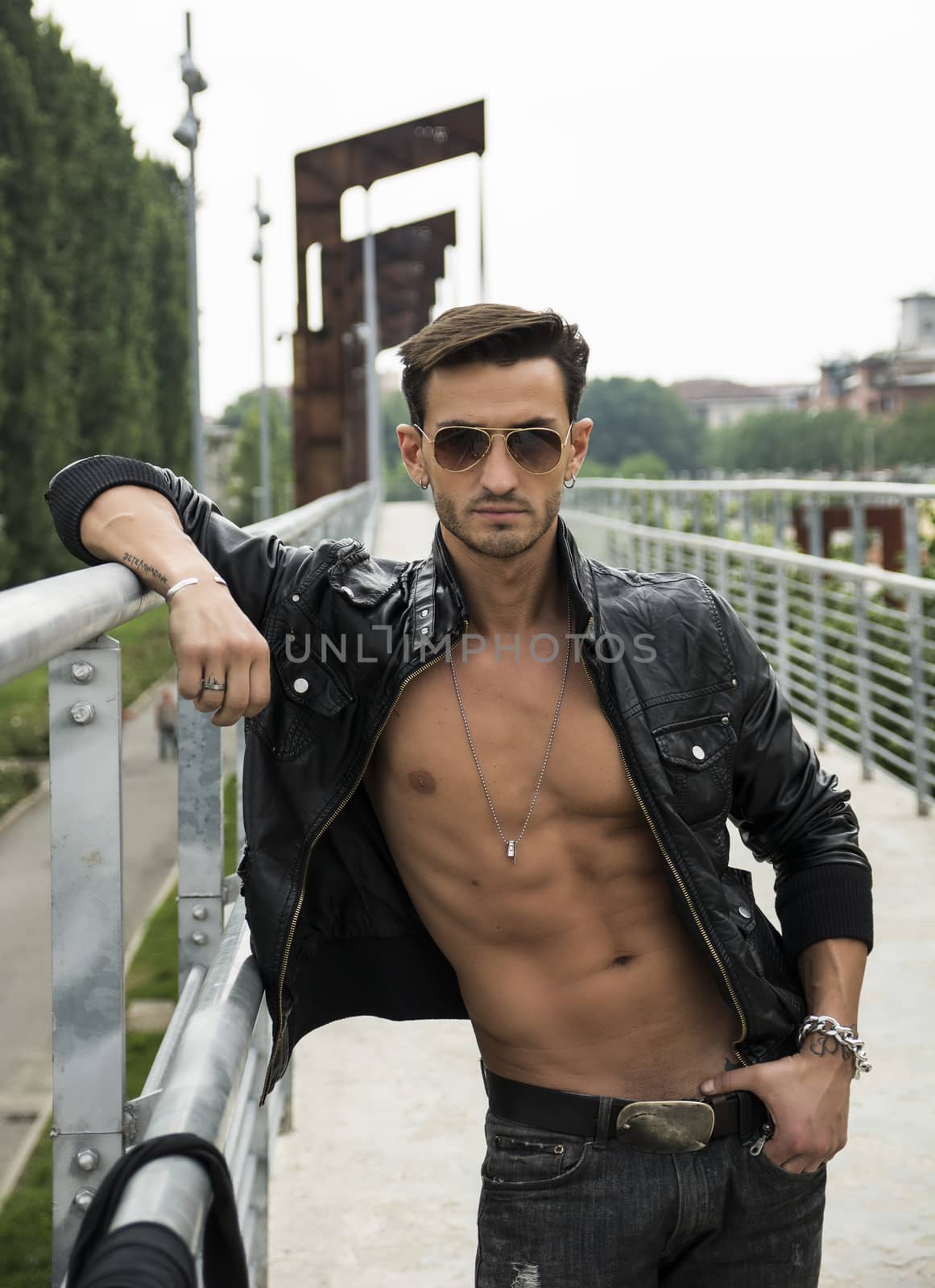 Handsome man outdoor in urban environment by artofphoto