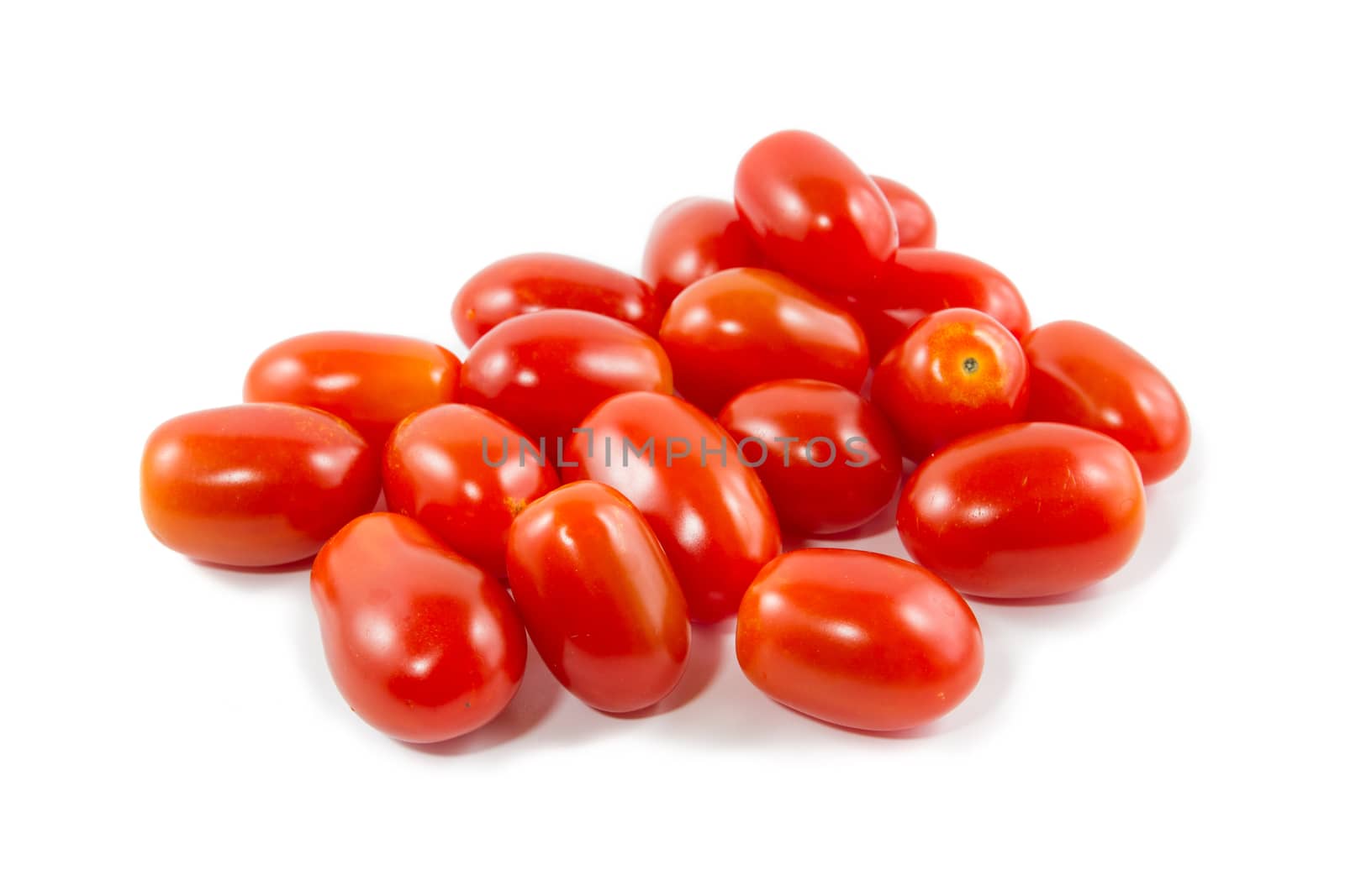 Group of cherry tomatoes isolated on white background