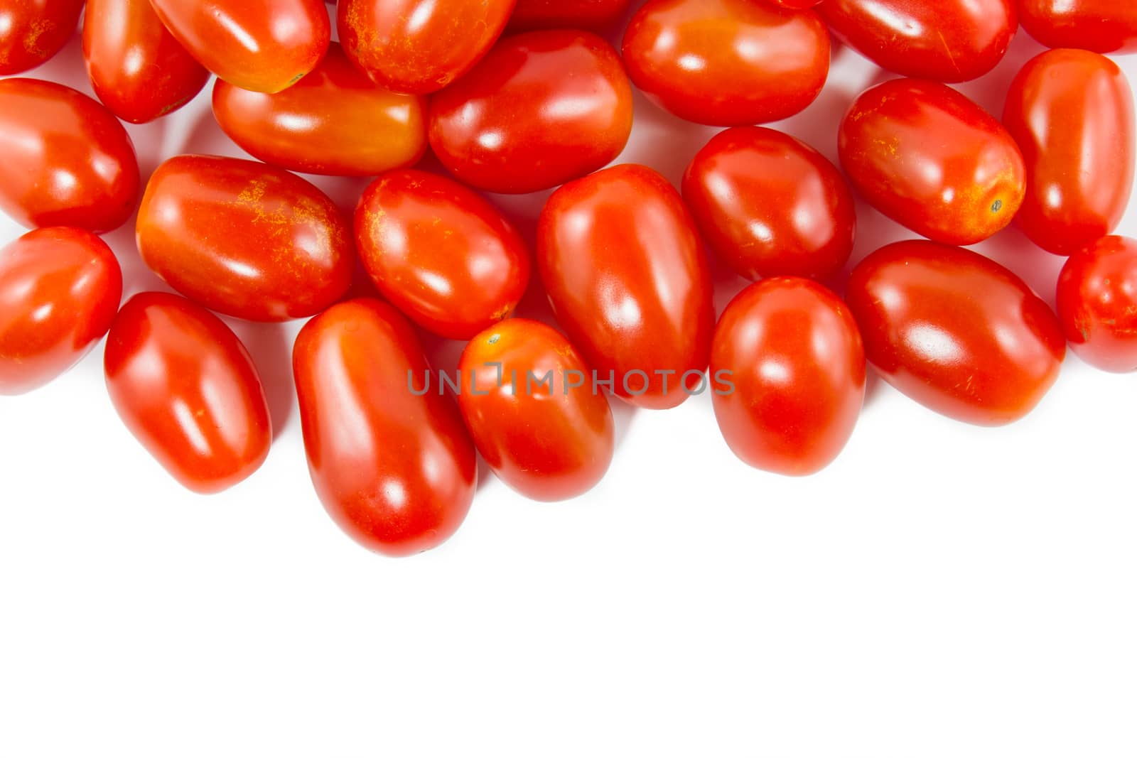 Group of cherry tomatoes isolated on white background