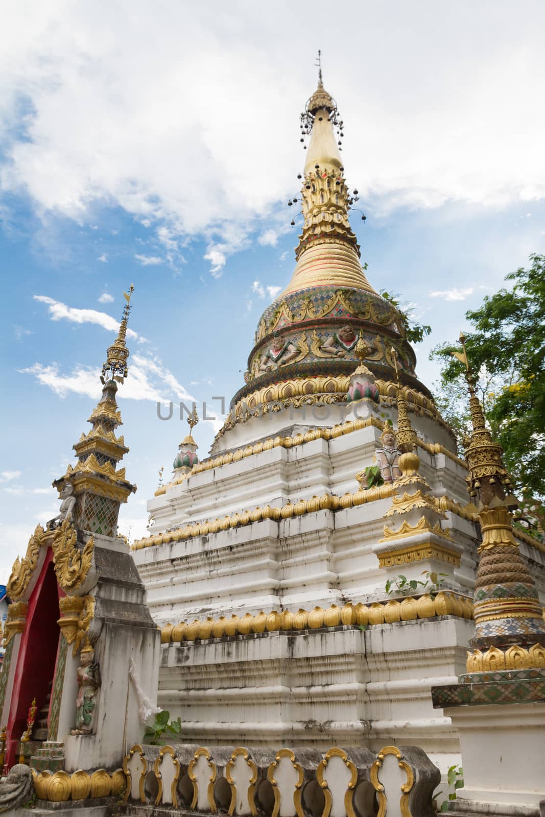 White pagoda of Buddhist temple in Chiang Mai, Thailand by kasinv