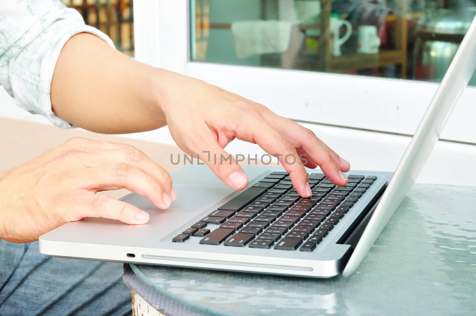 business man hands busy using laptop by thampapon
