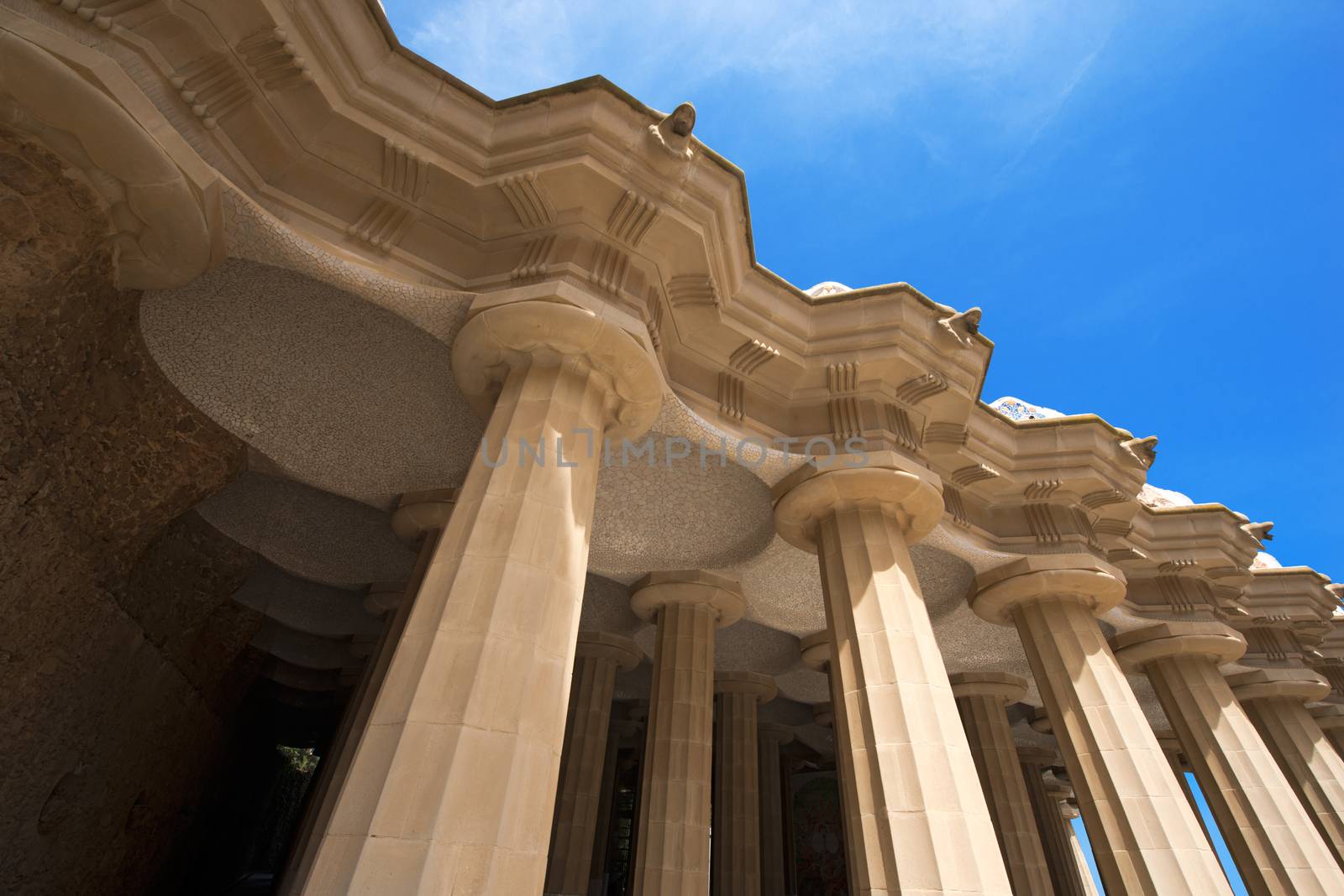 100 Doric columns hold the square above in Park Guell (1900-1914) of Barcelona - Spain. Architect Antoni Gaudi (1852-1926)