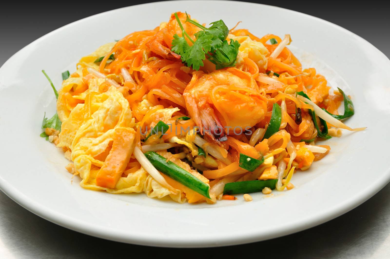 Pad Thai with Fresh Shrimp Covered with Fried Egg.