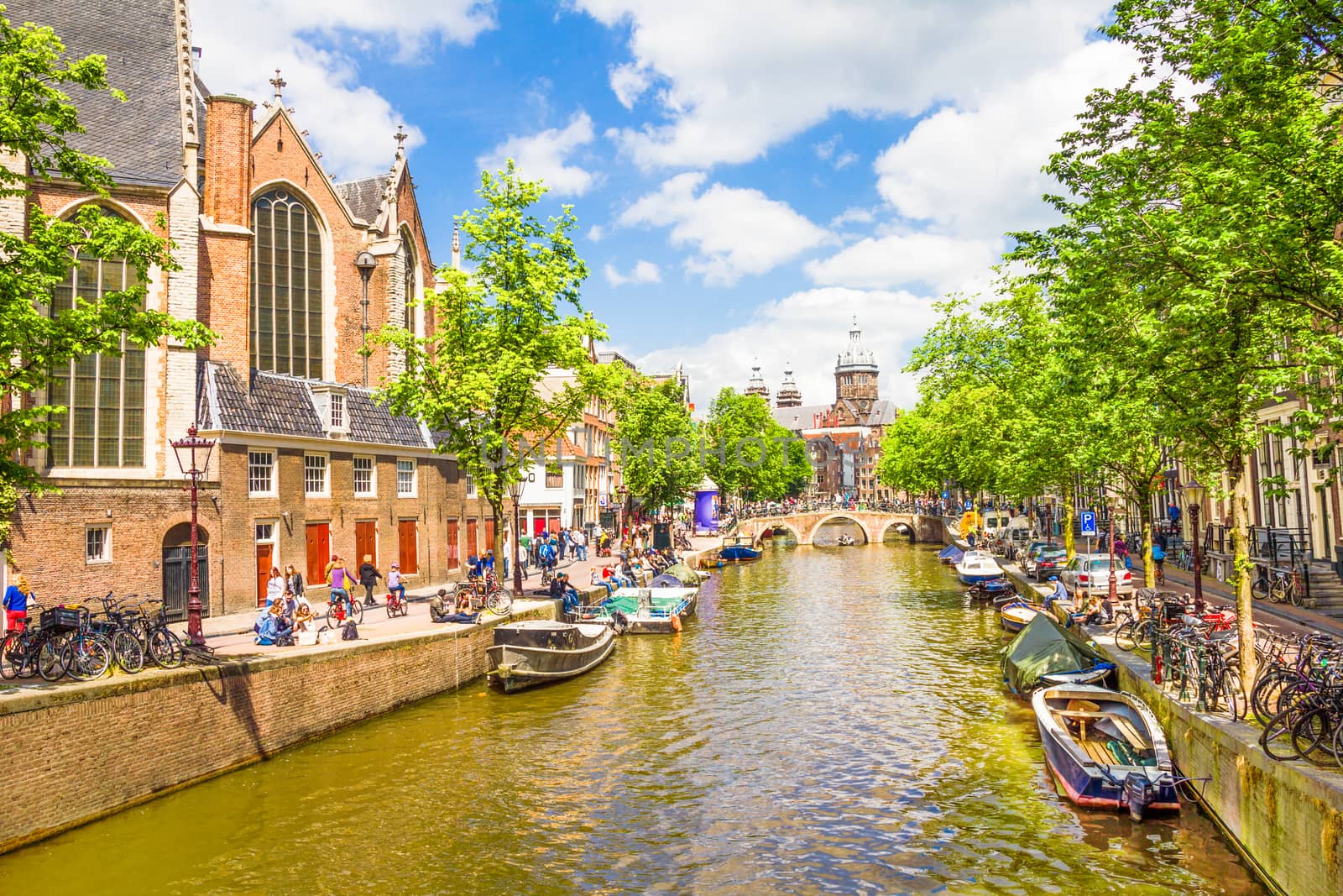 Amsterdam is the capital of the Netherlands and the canals and harbours fill a full quarter of the city surface.