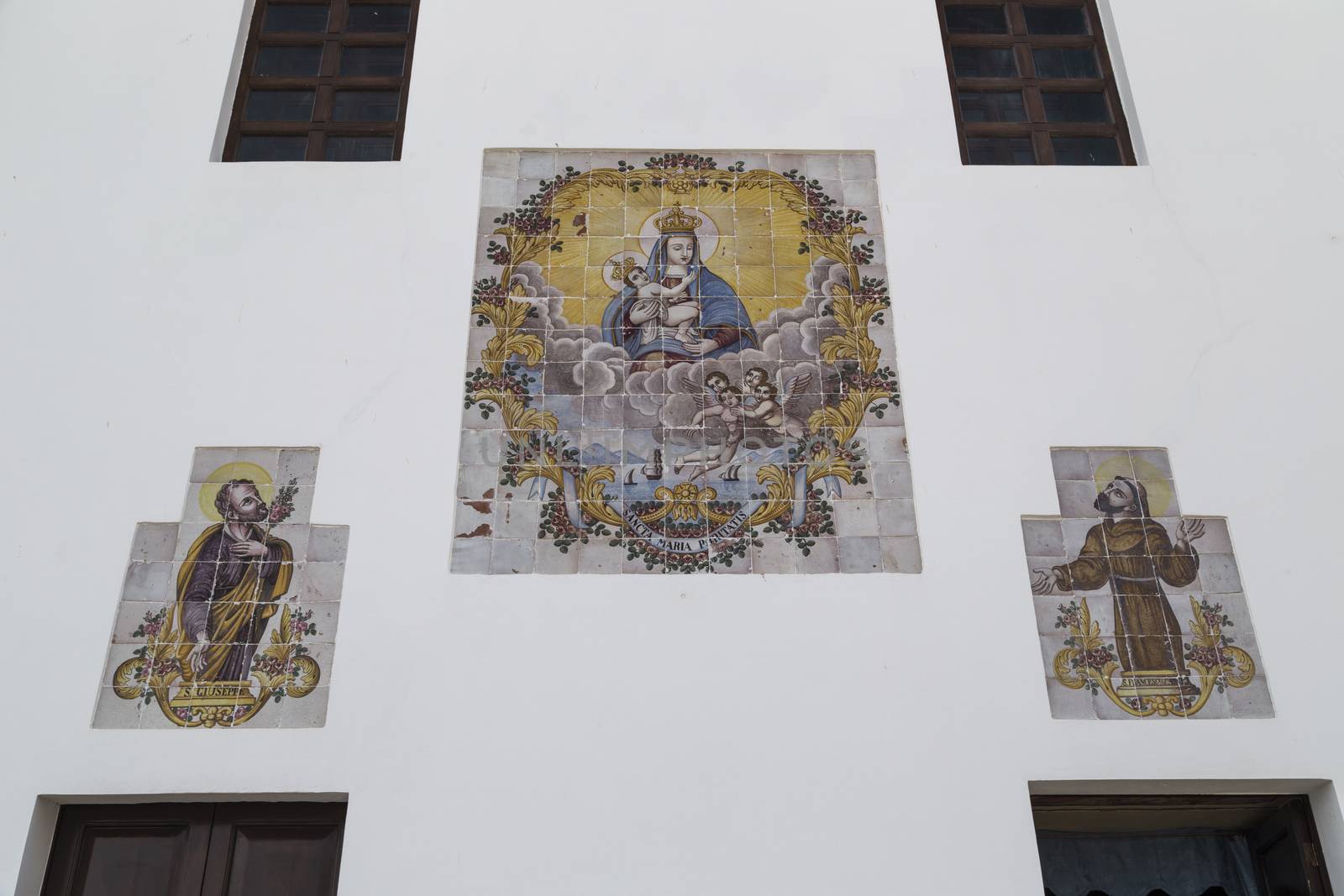 Paintings of the Blessed Virgin Mary on the facade of Church La Puritate  the old town of Gallipoli (Le) in the southern of Italy