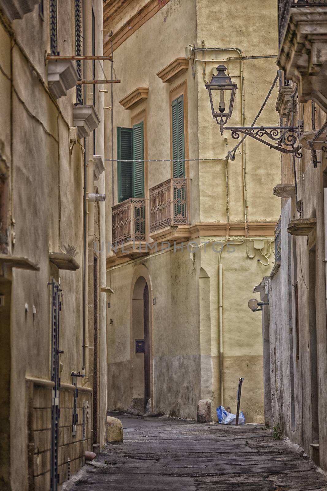 Old alley  in the old town of Gallipoli (Le)) in the southern of Italy