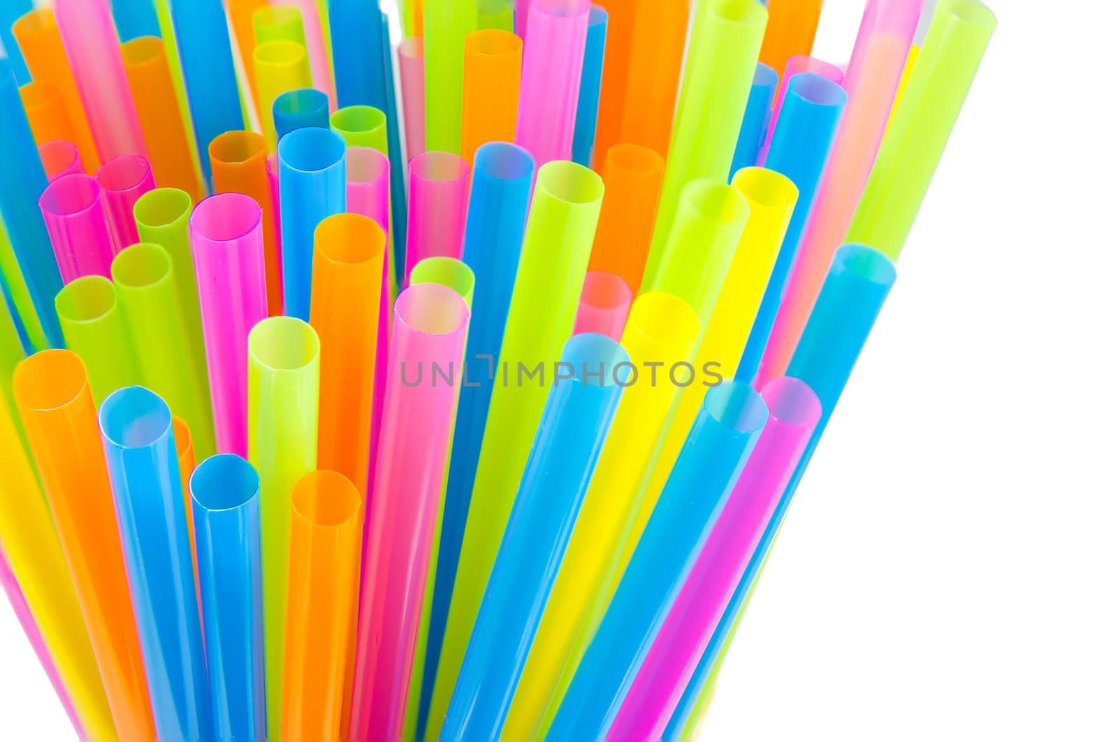 Closeup view of colorful drinking straws isolated on white background