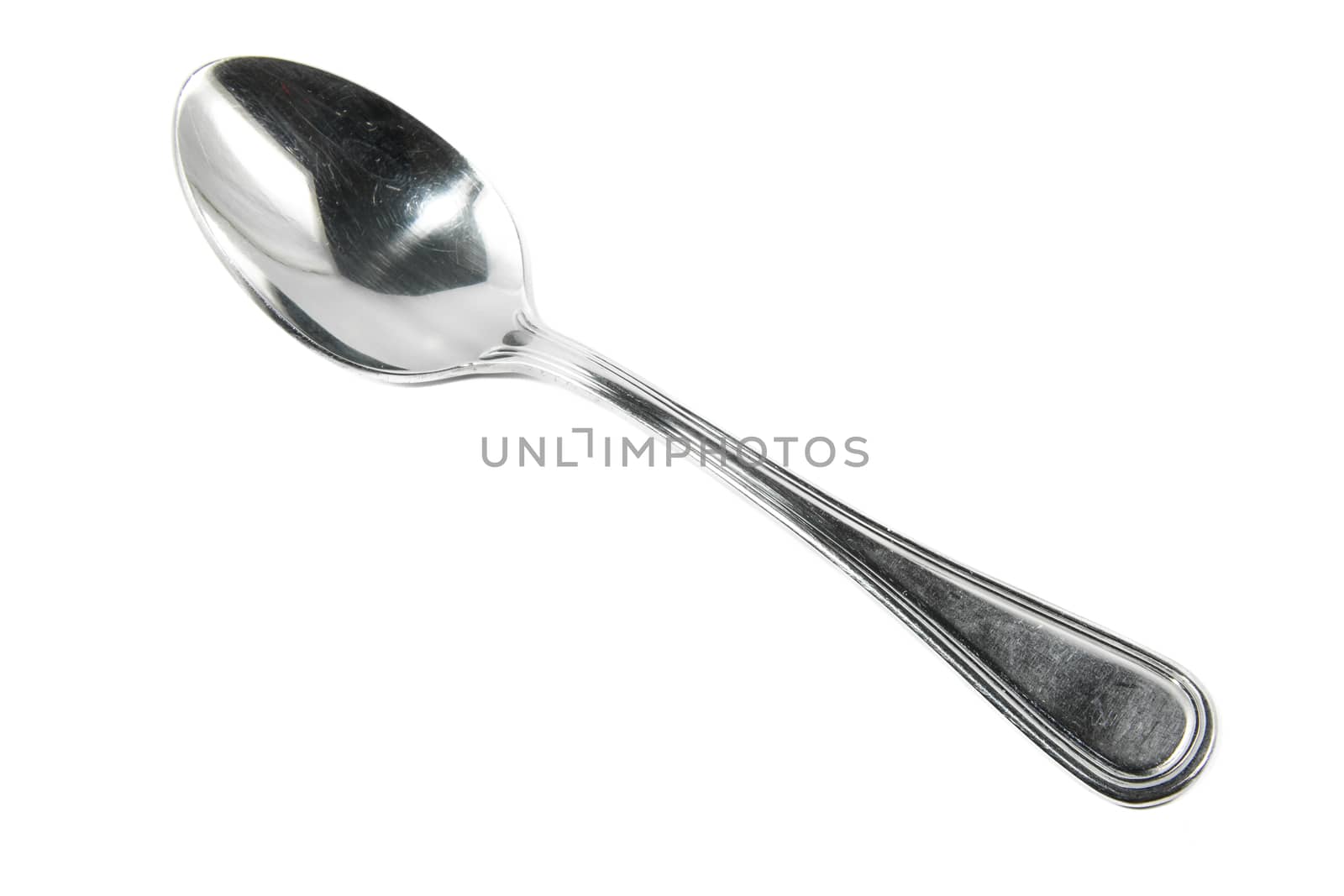 Closeup view of spoon isolated on white background