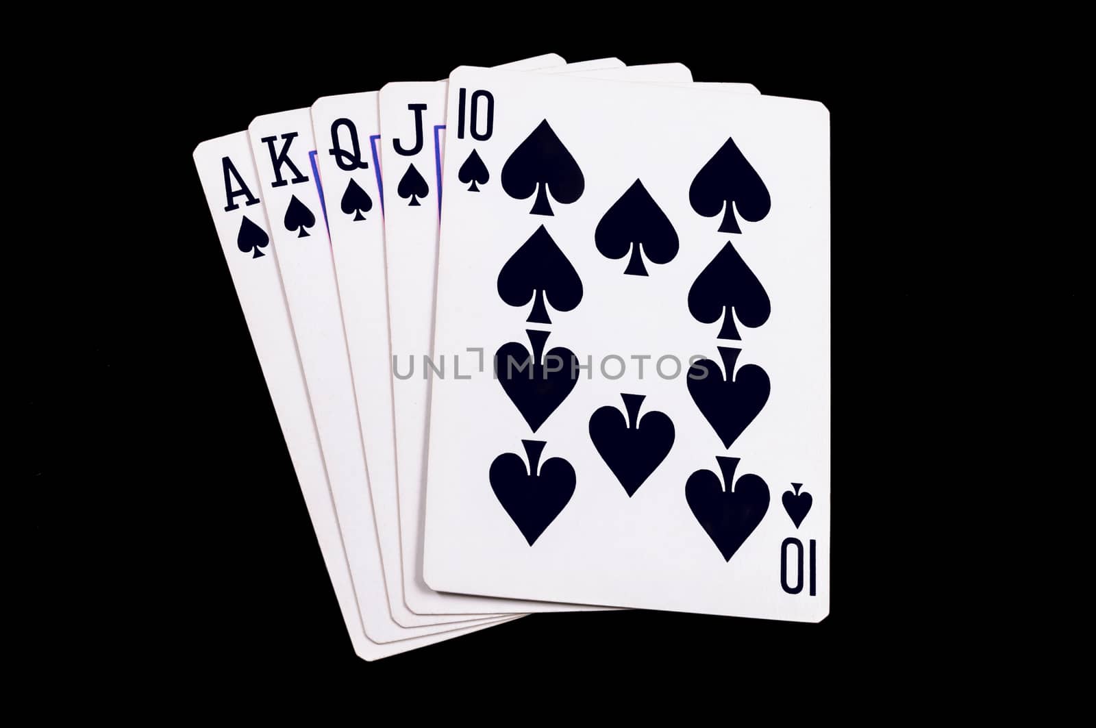 Flush royal cards isolated on black background 