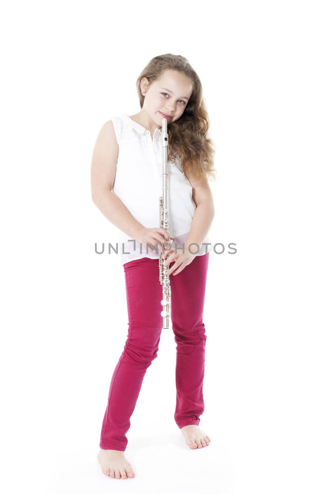 young  girl holding flute standing by ahavelaar