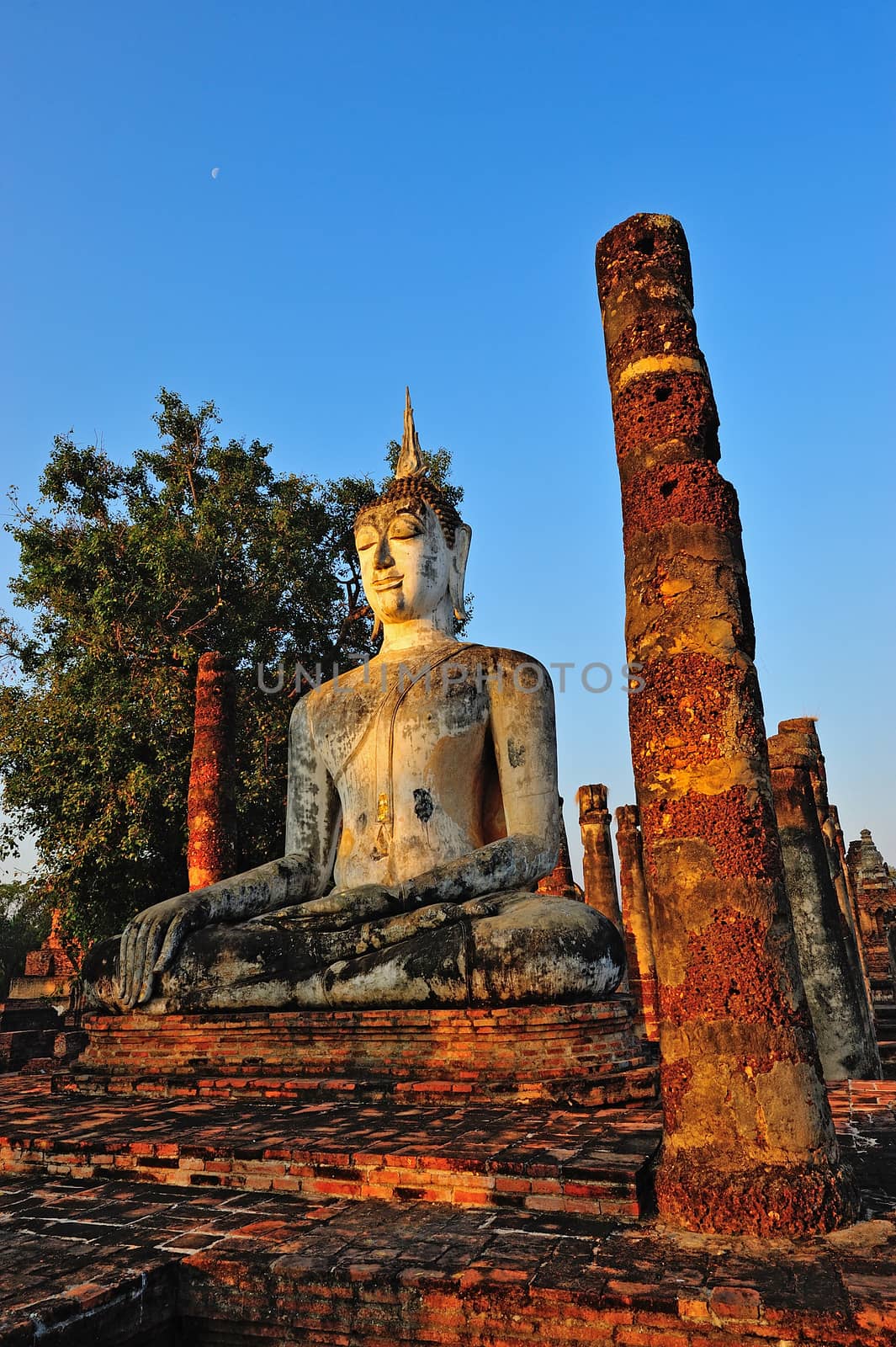 Ancient buddha statue. Sukhothai Historical Park, Sukhothai Prov by think4photop