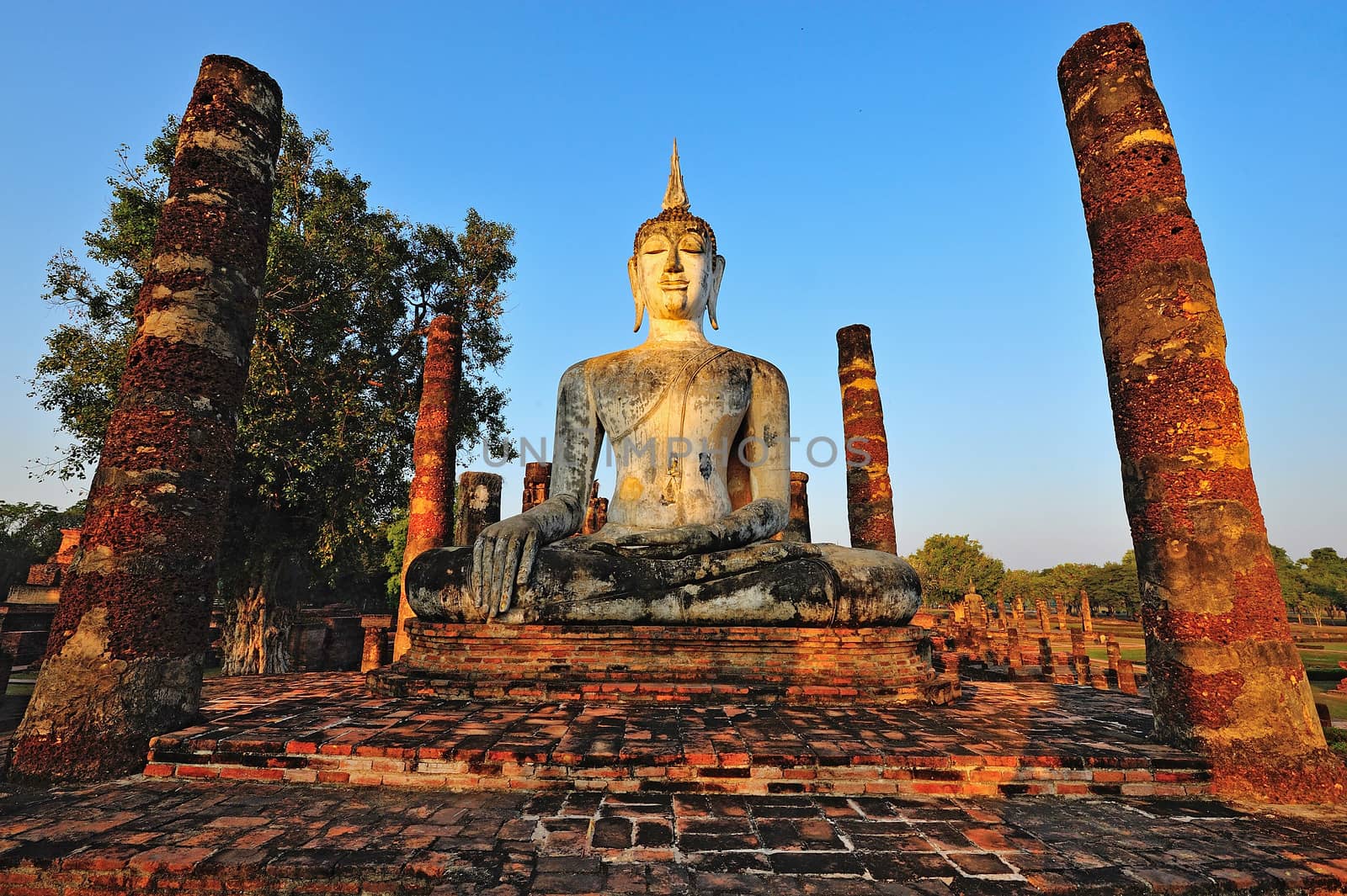 Ancient buddha statue. Sukhothai Historical Park, Sukhothai Prov by think4photop