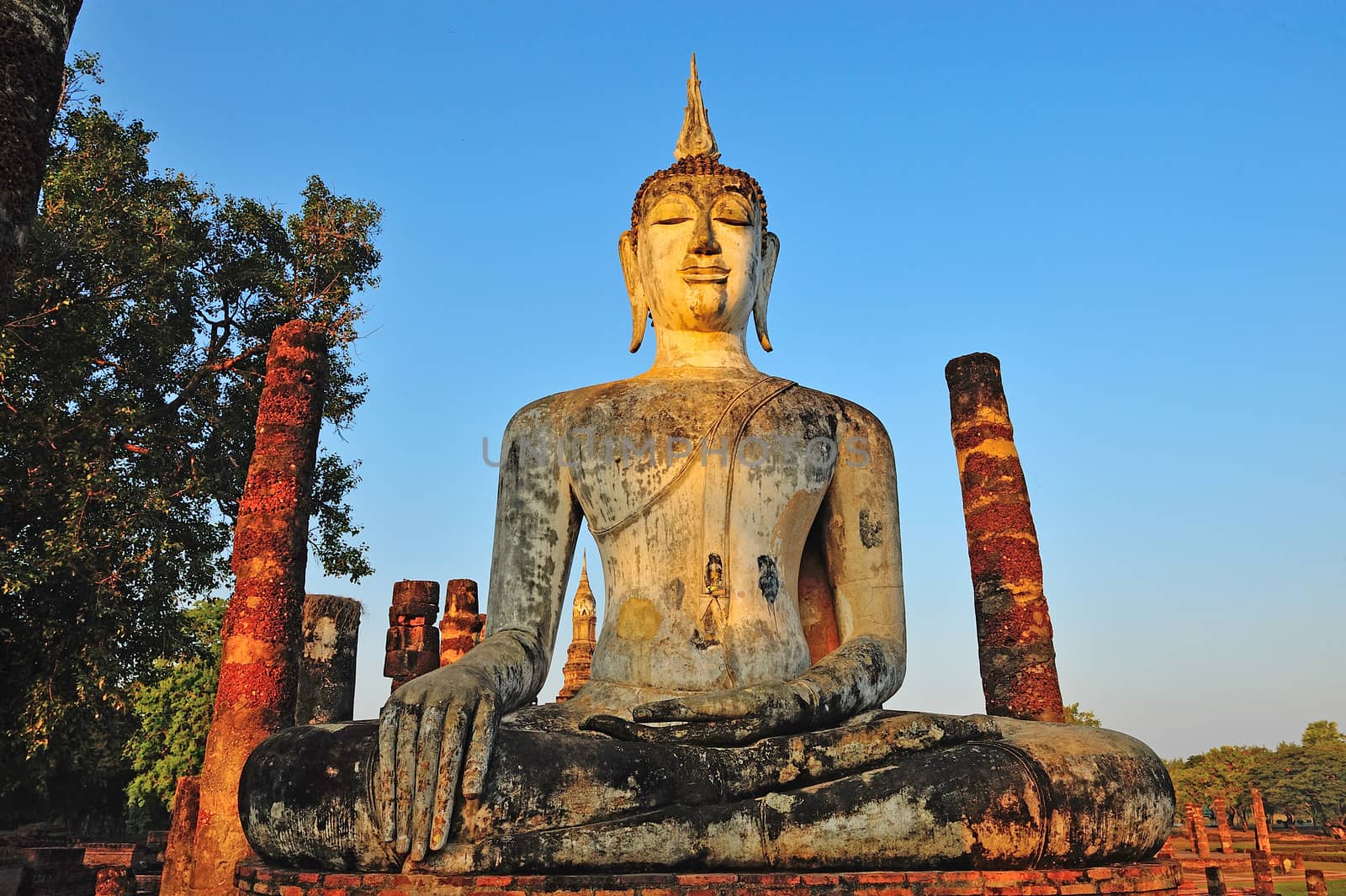 Ancient buddha statue. Sukhothai Historical Park, Sukhothai Prov by think4photop