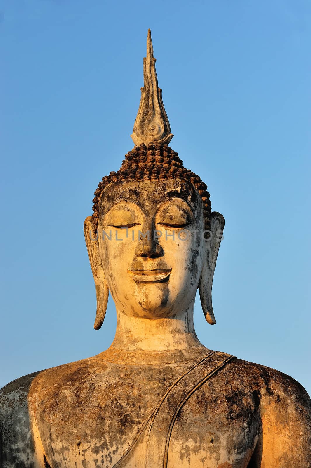 Ancient buddha statue. Sukhothai Historical Park, Sukhothai Prov by think4photop